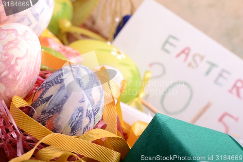 Image of Easter setting with gift box and spring decoration