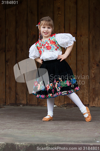 Image of Dancing little girl acting on the stage