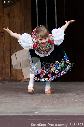 Image of little girl in traditional costume