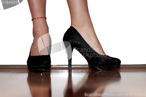 Image of Female legs in shoes
