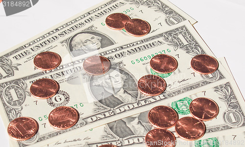 Image of Dollar coins and notes