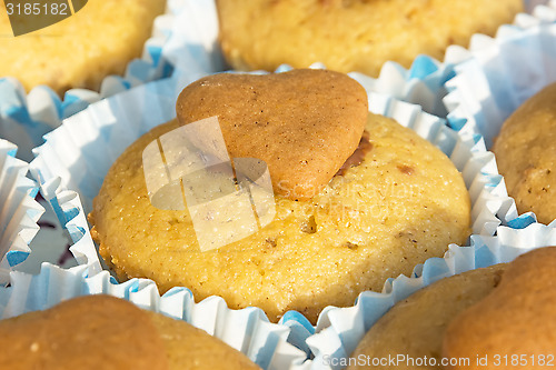 Image of Mini cupcake with decoration in the form of a heart.