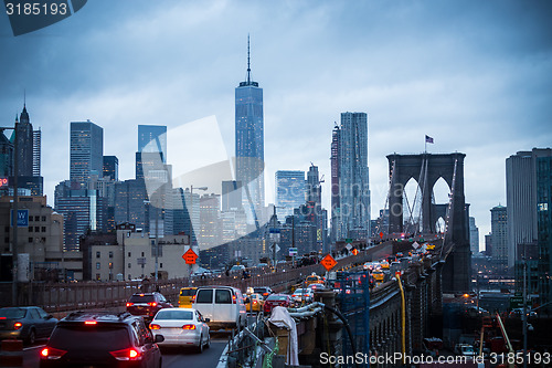 Image of Brooklyn bridge at dusk, New York City.