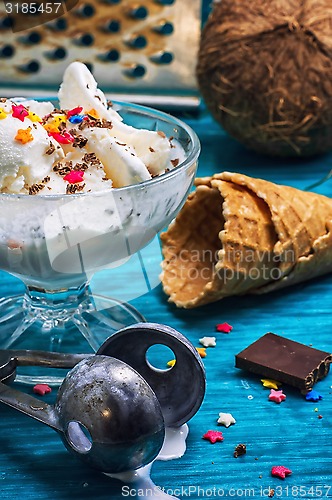 Image of coconut ice cream in bowl and two waffle cup