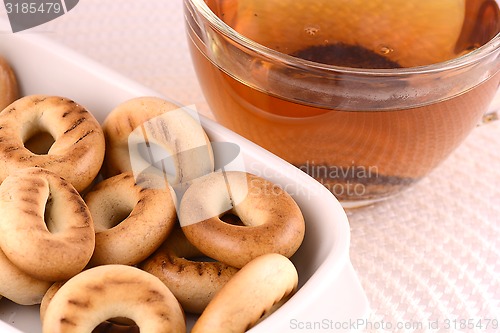 Image of cup of tea (coffee) and some cookies 