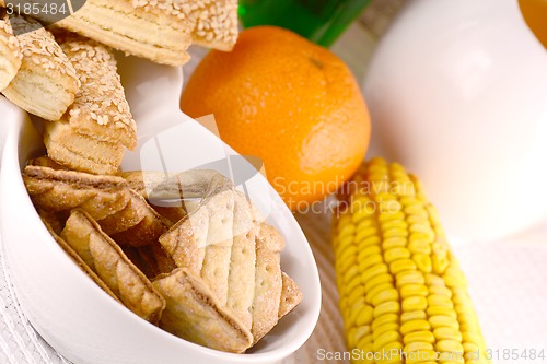 Image of sweet cake on white plate and fruits