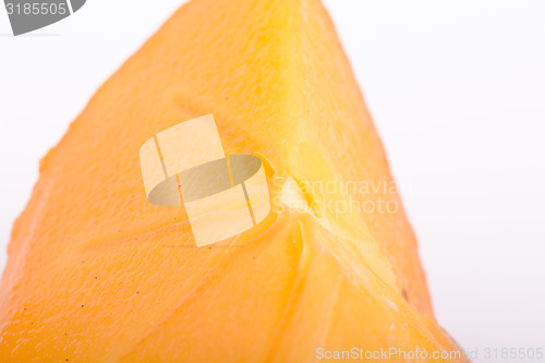 Image of persimmon slice close up