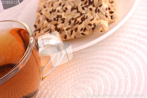 Image of cup of tea (coffee) and some cookies 