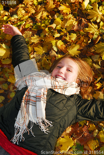 Image of Girl in a fall park