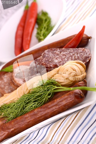 Image of Pepperoni Salami and cheese on a cutting board