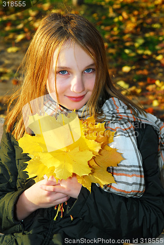 Image of Girl with autumn leaves