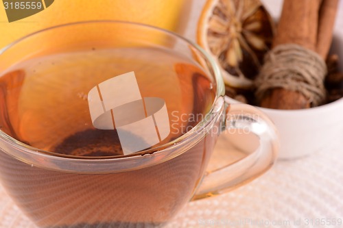 Image of cup of tea (coffee) and old fruits