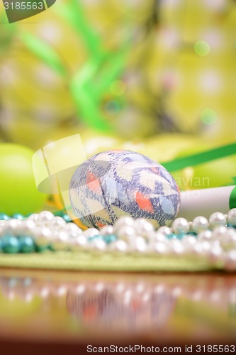 Image of Easter background with eggs, ribbons and spring decoration