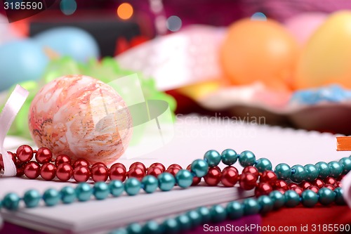 Image of Easter background with eggs, ribbons and spring decoration