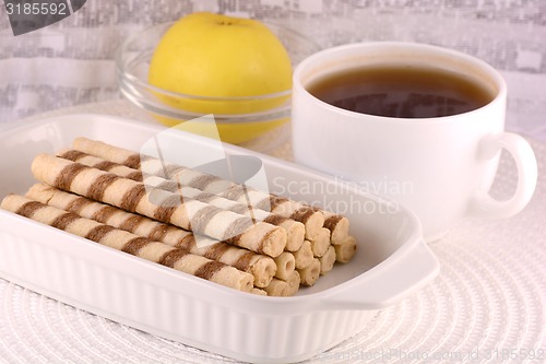 Image of cup of tea (coffee) and some cookies 