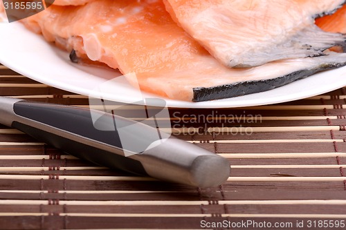 Image of Fresh uncooked red fish fillet slices