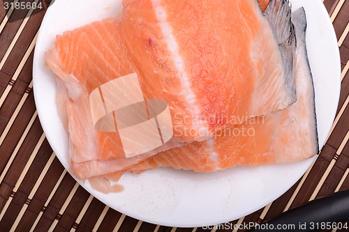 Image of Fresh uncooked red fish fillet slices