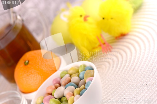 Image of sweet candies and cartoon chicken