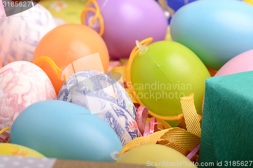 Image of Easter background with eggs, ribbons and spring decoration