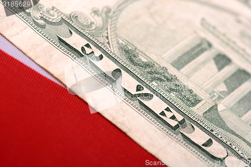 Image of american dollars on american flag