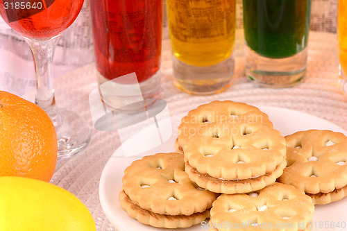 Image of sweet cake on white plate and fruits
