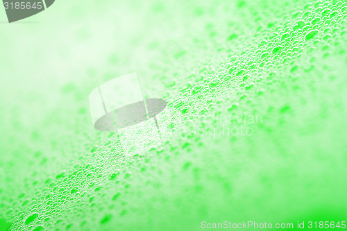 Image of green water drops close up