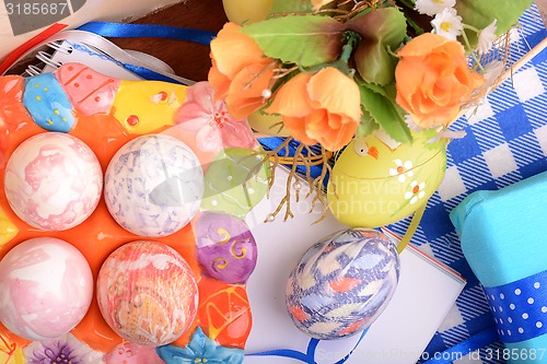 Image of Easter background with eggs, ribbons and spring decoration