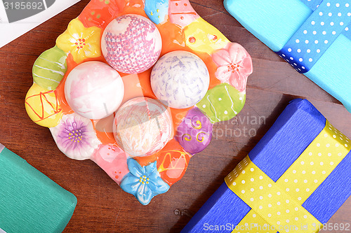 Image of Easter background with eggs and gift box