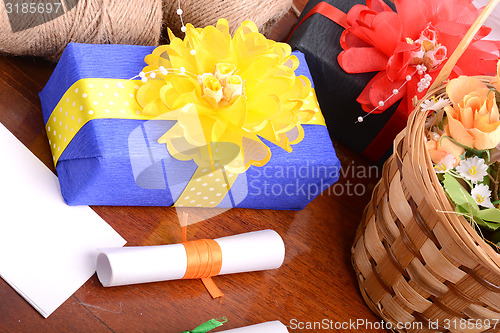 Image of Flowers and gift box, holiday concept