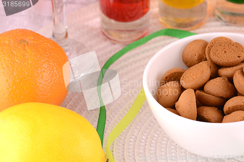 Image of sweet cake on white plate and fruits