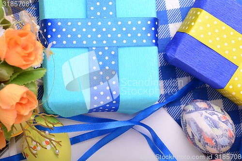 Image of Easter background with eggs, ribbons and spring decoration