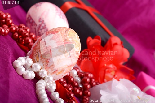 Image of Easter background with eggs, ribbons and spring decoration