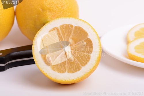 Image of juicy ripe lemons close up