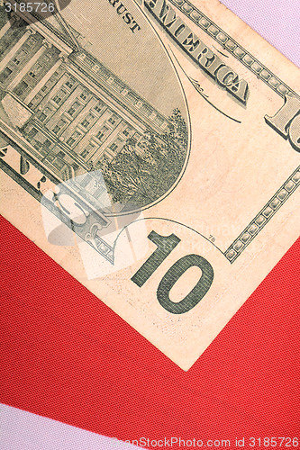 Image of american dollars on american flag