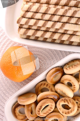Image of sweet cake on white plate with fruits