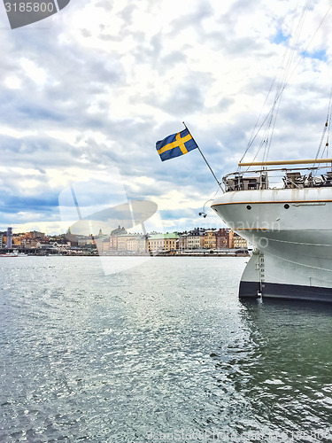 Image of Ship with Swedish flag and view over Gamla Stan, Stockholm