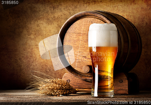 Image of Wooden barrel and beer