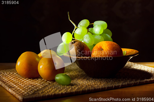 Image of Still life. Fruit on a wicker tray