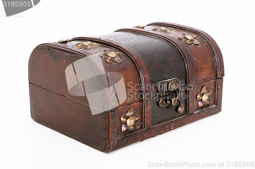 Image of chest on a light background. Wood with bronze