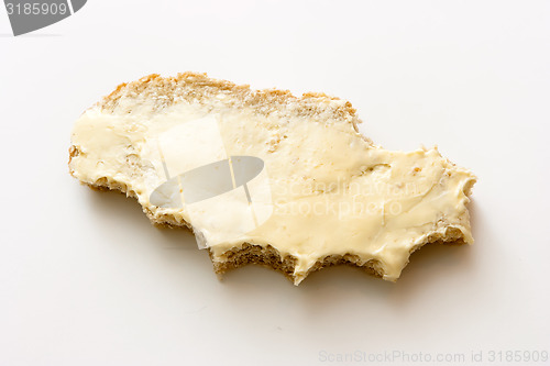 Image of sandwich. Bread and butter on a light background