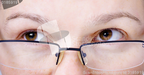 Image of face with glasses close up. Eyes aside