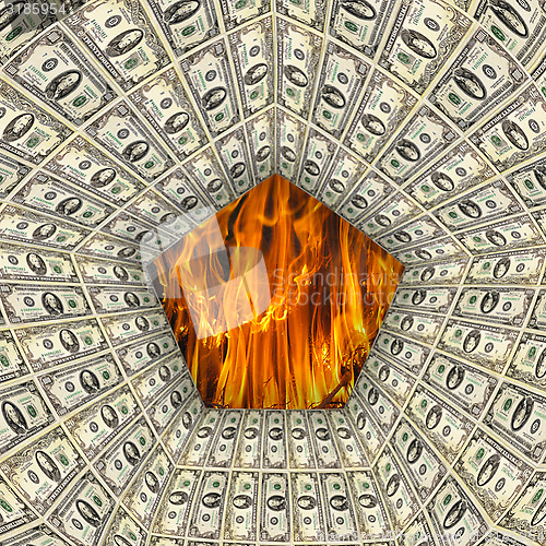 Image of dollar pattern with flame on the background