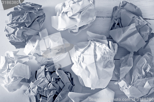 Image of crumpled up paper wads