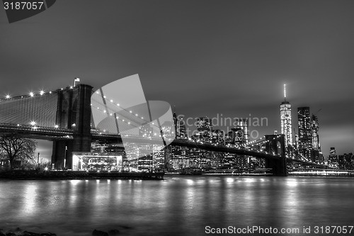 Image of Brooklyn bridge at dusk, New York City.