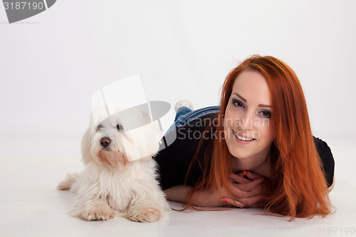 Image of Young woman with her dog