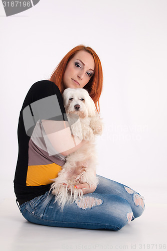 Image of Young woman with her dog