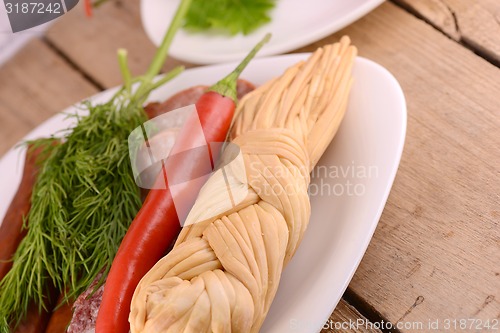 Image of salami, cheese and red pepper