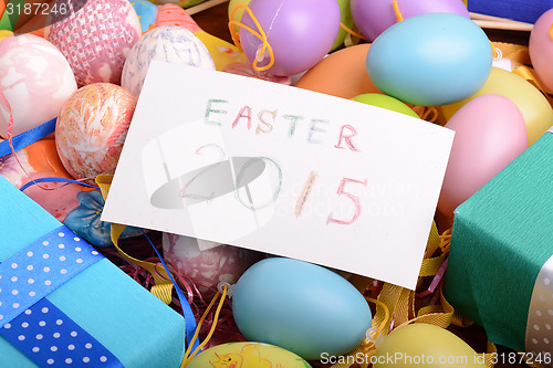 Image of Easter background with eggs, ribbons and spring decoration