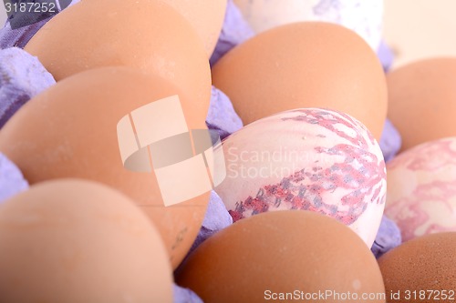 Image of close up of eggs in cardboard container