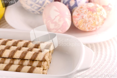 Image of sweet cake and easter eggs